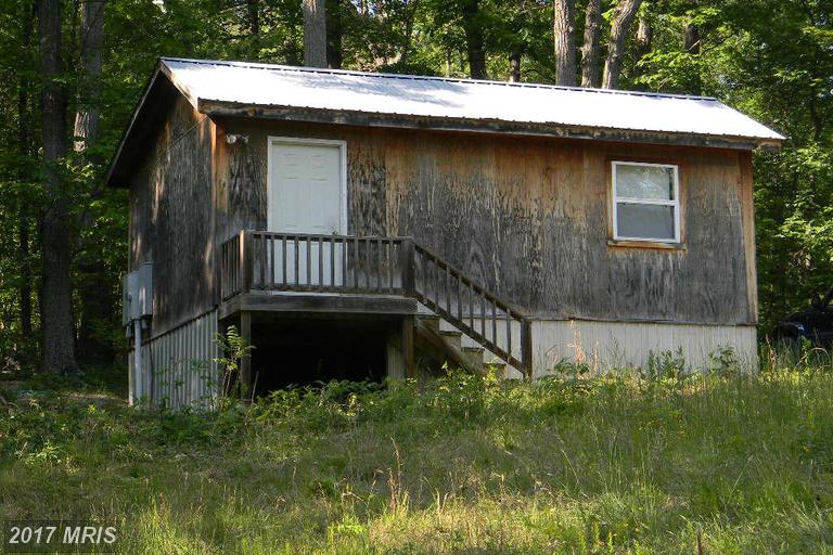 UNFINISHED INSIDE. 384 SQ. FT. W/ PORCH, TWO ENTRANCES