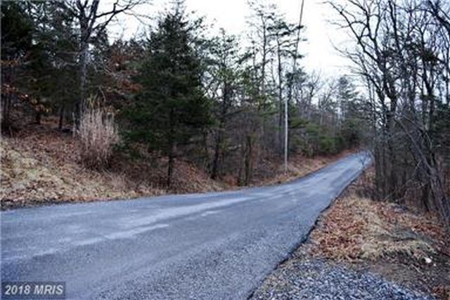 PAVED ROAD, UTILITIES FOR ALL YEAR ACCESS