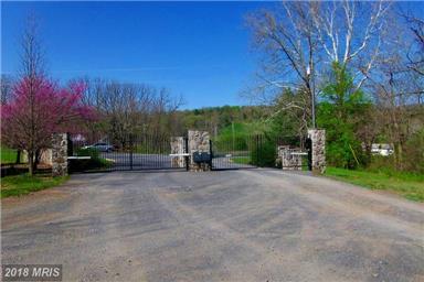 NEARBY SAFE GATED AREA OF GRAND UPSCALE HOMES